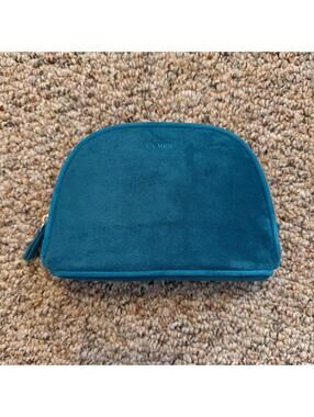 La Mer blue suede makeup bag